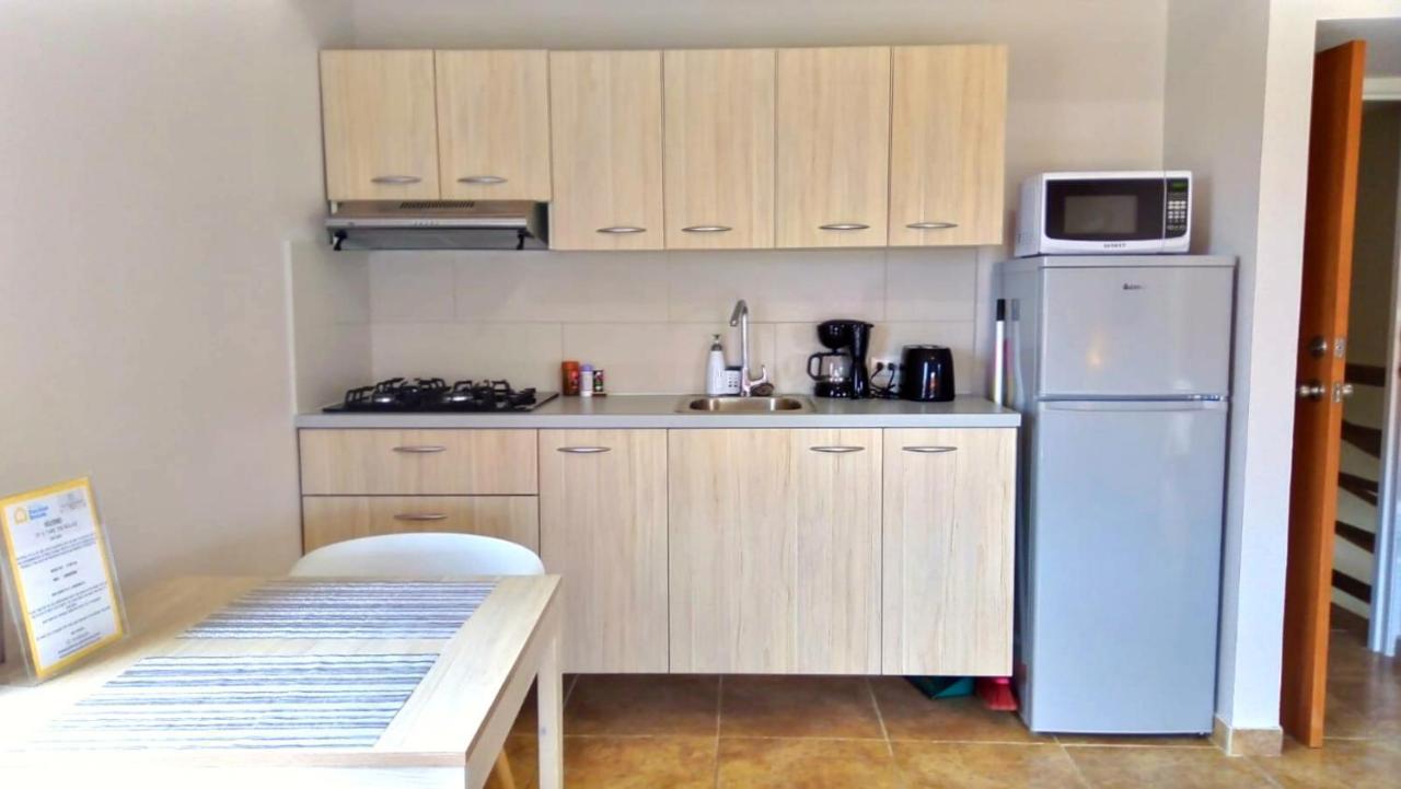 Rooi Santo Residence Palm Beach Bagian luar foto