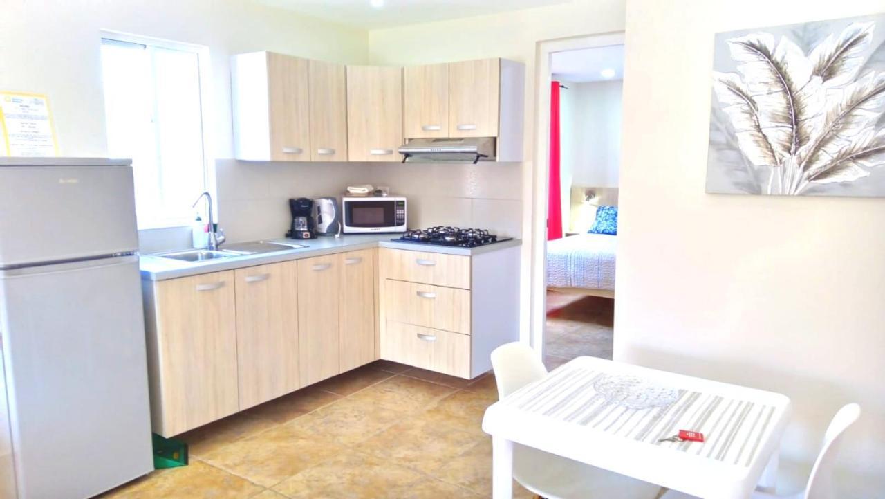 Rooi Santo Residence Palm Beach Bagian luar foto